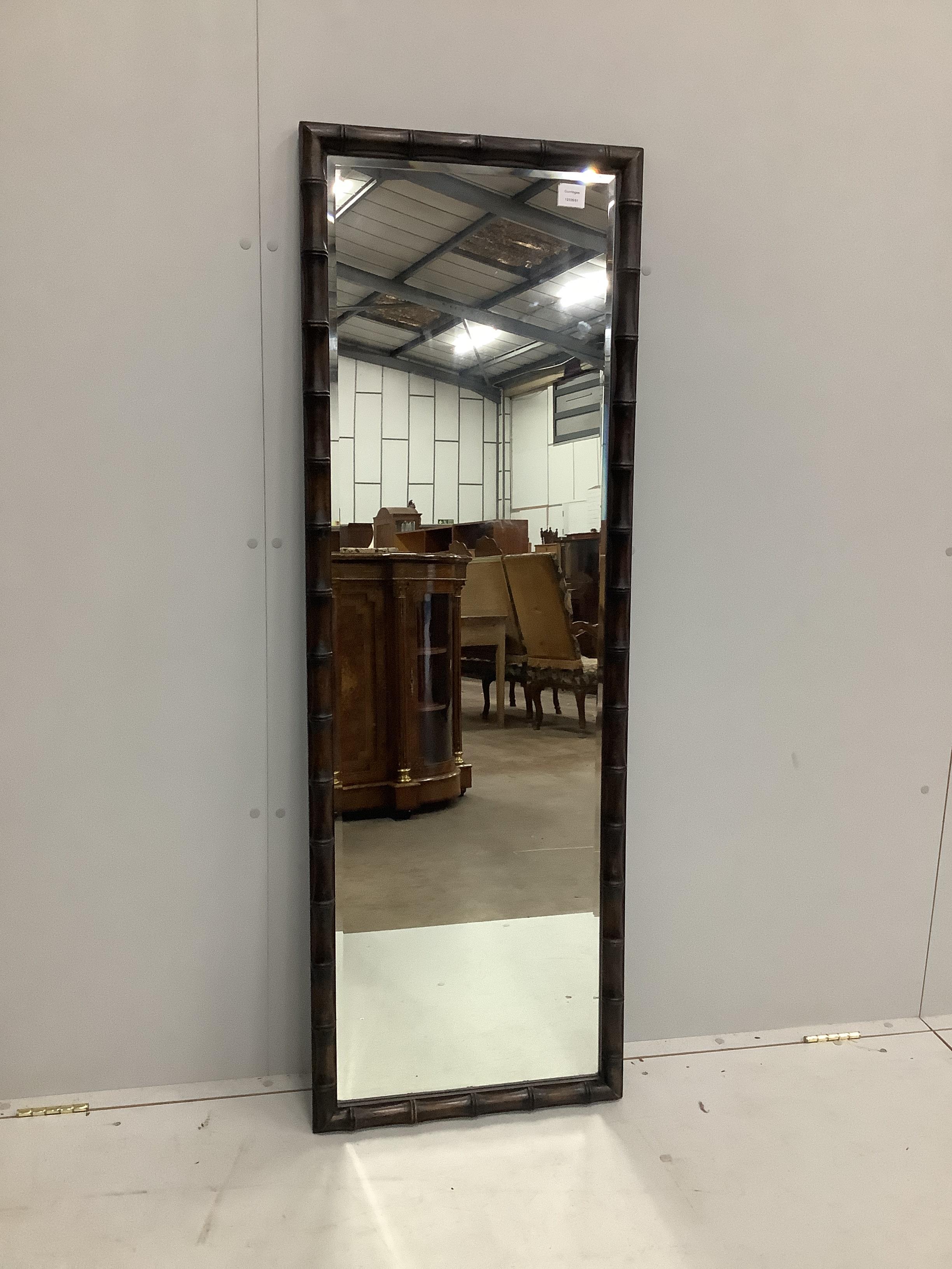A contemporary rectangular bamboo effect wall mirror, width 51cm, height 151cm